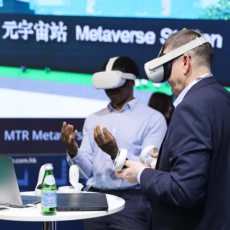 Participants trying out VR devices at the UITP Summit